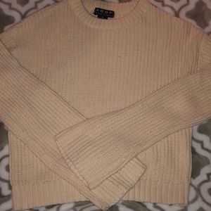 tan sweater